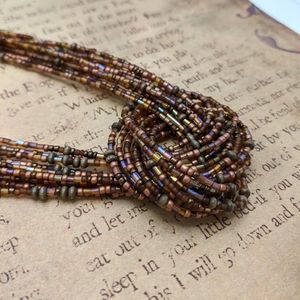 Multi string bead necklace